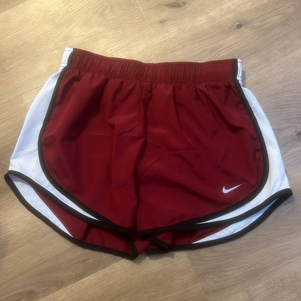 Maroon Nike athletic shorts